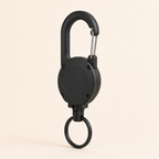 Rear three-quarter studio view of the TUGLO retractable key keeper
